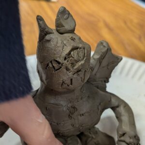Making a clay grotesque