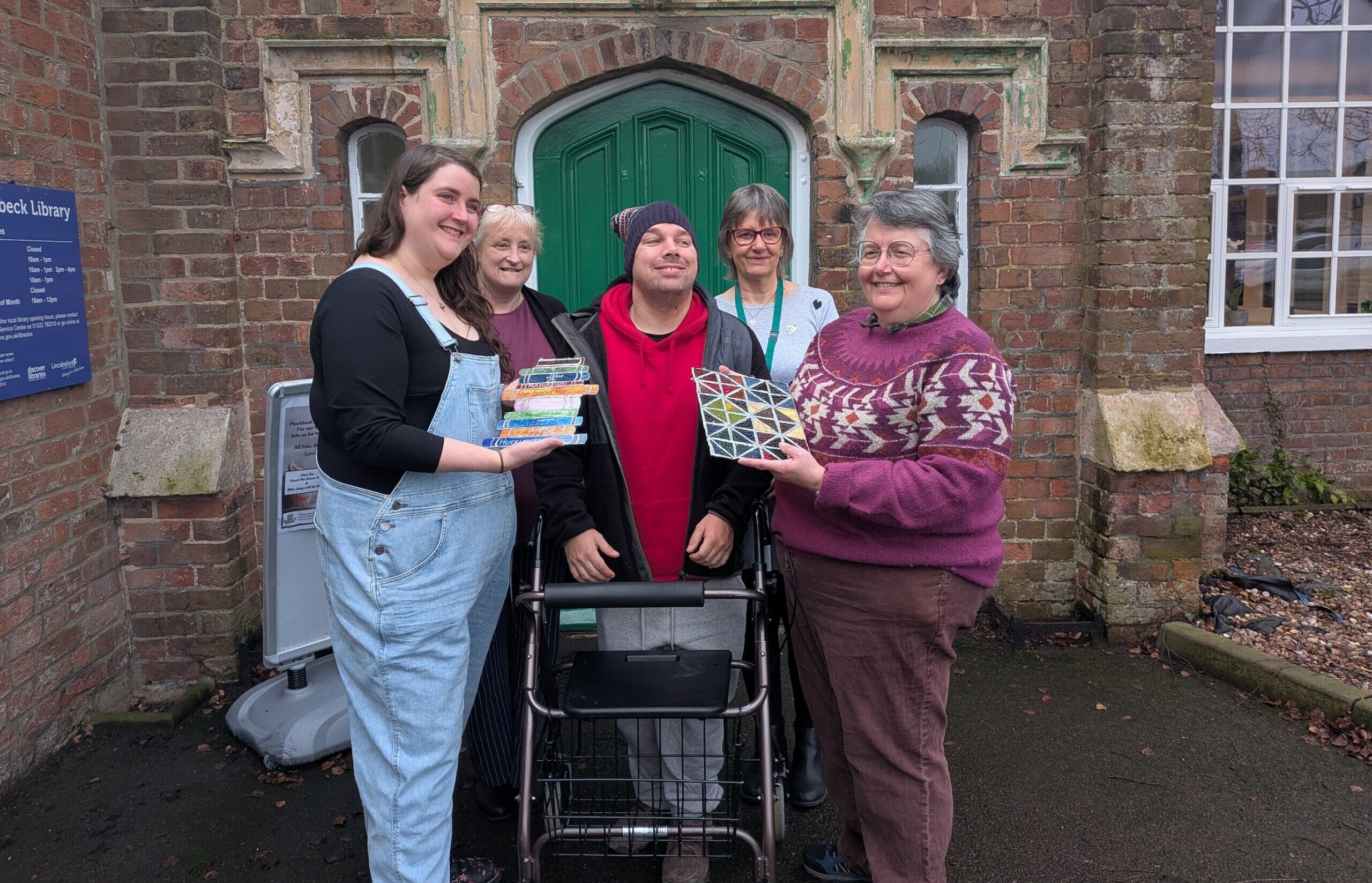 Local children create a heritage-inspired display for their community library